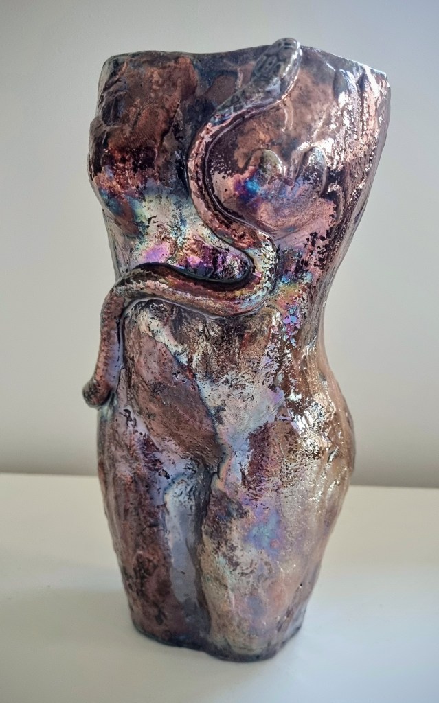Raku fired snake and female naked figure art